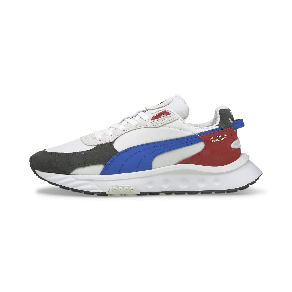 PUMA Mixte Wild Rider Rollin' Chaussure de Piste d'athlétisme