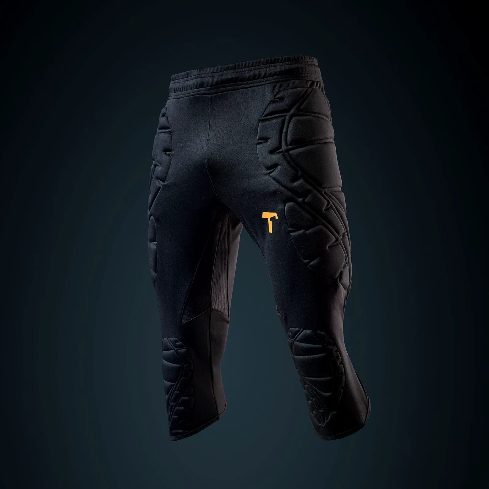 T1TAN Pantalon 3/4 - pour Les Gardiens -Pantalon d'entraînement avec des Protections légères au Niveau des Hanches et des Genoux et Une Zone de Genoux étendue à l'avant Font
